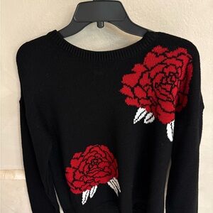 VENUS Black Sweater with Bold Red Floral Accents